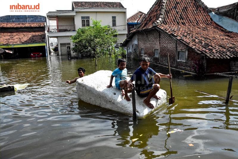 Musim hujan tiba, kamu harus menyiapkan banyak hal demi mengantisipasi banjir. (Inibaru.id/Audrian F)
