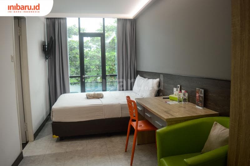 Suasana kamar deluxe yang cukup lebar dan nyaman.&nbsp;(Inibaru.id/Kharisma Ghana Tawakal)