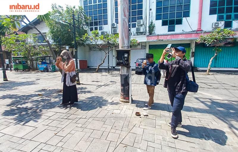 Skill memahami teknik dan pengambilan angle foto harus dikuasai para phonegrafer. (Inibaru.id/Fitroh Nurikhsan)