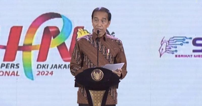 Presiden Joko Widodo mengesahkan&nbsp;Perpres Publishers Rights pada puncak peringatan Hari Pers Nasional di Ancol, Jakarta (20/2/2024). (Antara/Andi Firdaus)