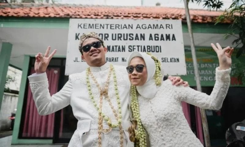 Kamu bisa melakukan pendaftaran nikah secara daring melalui Sistem Informasi Manajemen Nikah (Simkah) Kemenag. (Wedding Market)