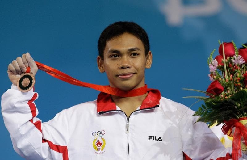 Eko Yuli Irawan saat kali pertama meraih medali olimpiade pada Olimpiade Beijing 2008. (X/BadmintonTalk)