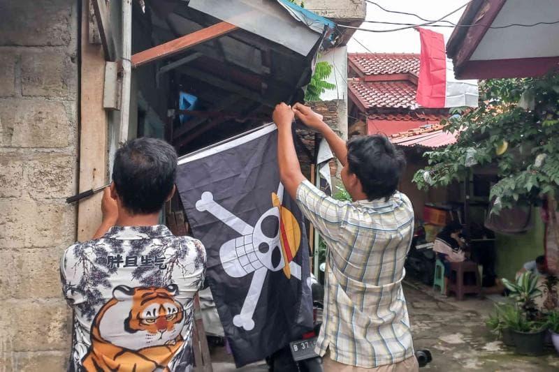Ilustrasi: Pengibaran bendera One Piece nggak boleh lebih tinggi dari Merah-Putih. (Tempo/Dinda Shabrina)