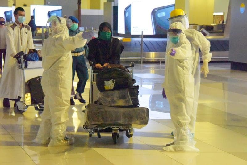 Prosedur pencegahan dan penanganan Covid-19 di bandara (Pikiran-rakyat/Evi Sapitri)