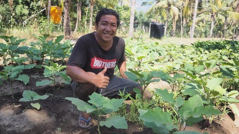 Dewa Ketut Arta, salah seorang perantau yang mudik untuk bertani. (Cnn/Anton Muhajir)