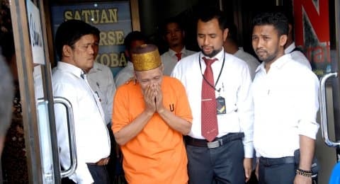 Puang Lalang saat digiring oleh Kepolisian. (Suara)