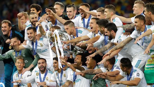 Pemain Real Madrid melakukan selebrasi usai menjadi juara Liga Champions 2018 di Stadion NSK Olimpiyskiy, Ukraina, Sabtu (26/5/2018). (AP/Sergei Grits)
