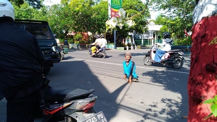 Agus Slamet, tukang parkir tunadaksa yang terus semanget bekerja (Tribun Jateng/Rifqi Gozali)
