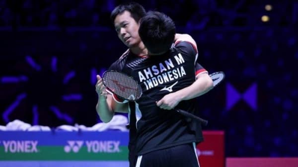 Ahsan/Hendra merayakan kemenangan di babak final All England 2019. (PBSI)