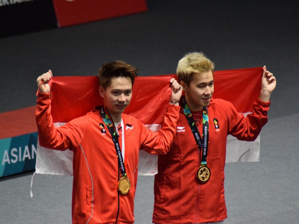 Marcus Gideon dan Kevin Sanjaya saat meraih emas bulu tangkis ganda putra untuk Indonesia (Nysnmedia.com/Photo Riz)
