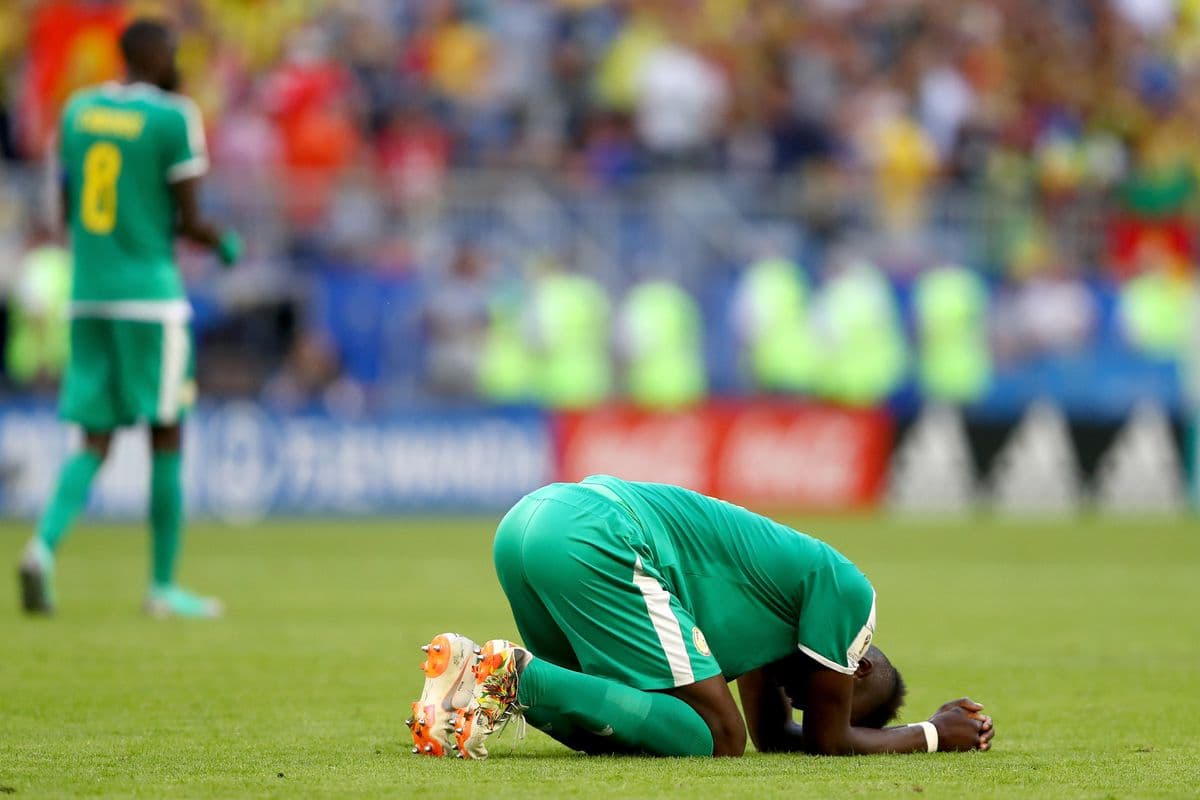 Pemain Senegal menyesali kegagalan lolos ke babak 16 besar Piala Dunia 2018 (Getty Images/Dean Mouhtaropoulos)