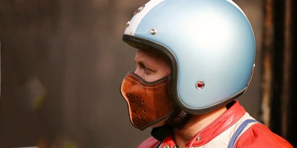 Ilustrasi pemotor menggunakan masker. (Wahanaritelindo)