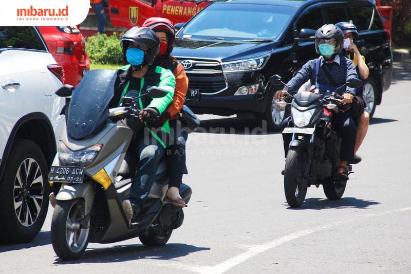 Cuaca panas, debu, hingga hujan jadi "musuh" pengguna sepeda motor Indonesia. (Inibaru.id/Triawanda Tirta Aditya)