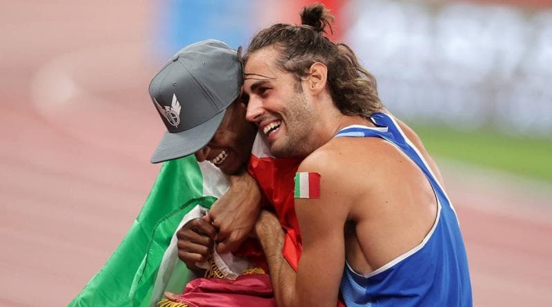 Atlet lompat tinggi dari Qatar dan Italia berbagi medali emas. Mutaz Barshim dan Gianmarco Tamberi sama-sama mencatat lompatan 2,37 meter. (Indianexpress/Reuters Photo)