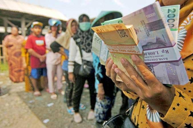 Ilustrasi:&nbsp;Bank Indonesia menyiapkan uang kartal sebesar Rp28,1 triliun di wilayah Jawa Tengah dan Daerah Istimewa Yogyakarta selama periode Ramadan dan Lebaran Idulfitri 1444 Hijriyah. (Antara/Oky Lukmansyah)