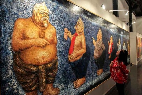 Lukisan berjudul "Semar Evolution" pada pameran tunggal lukisan Soehib Torajaya di Galeri Seni Kunstkring, Menteng, Jakarta, 3 Mei 2018. (MI/ Pius Erlangga)